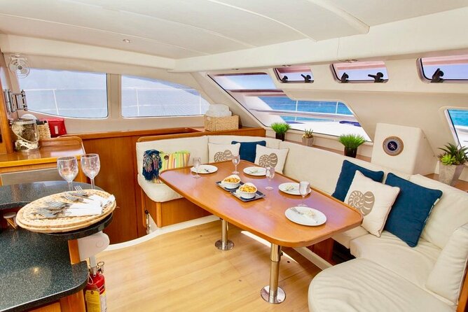 4hr Private Luxury Yacht with Snorkeling, DJ, Bar, Food - Food, seating, and comfort onboard