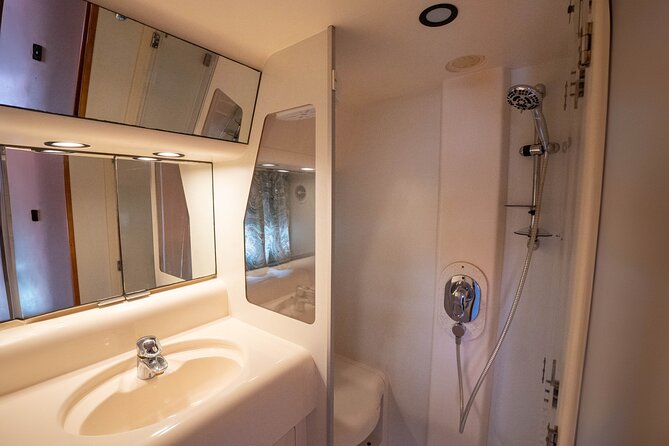70ft + Free Hour | Miami Yacht Rental | 3 to 8 Hours | 13 ppl - Passing through Brickell and beneath the Brickell Avenue Bridge