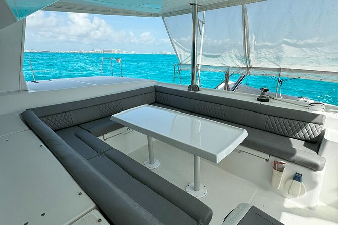 7hrs/60ft Luxury Catamaran Private Charter Cancun to Isla Mujeres - Sailing back toward Cancun at sunset