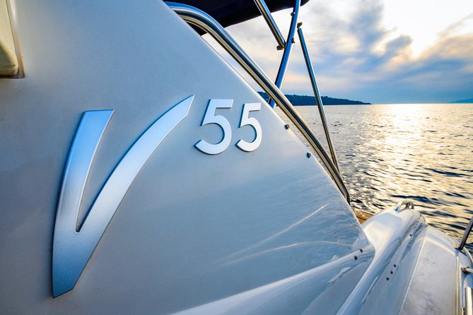 A Classy Capri Tour: a day on a luxury private yacht - Coral Grotto and the red rock below