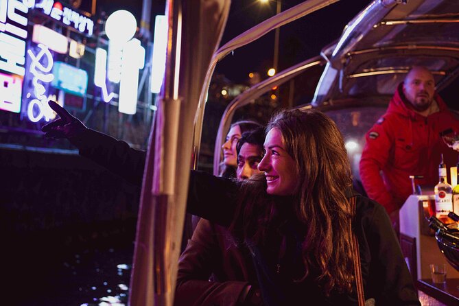 Amsterdam Light Festival: Canal Cruise + Bite & Unlimited Drinks - Commentary, humor, and the social side