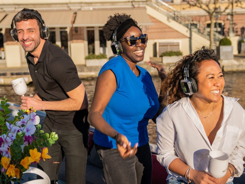 Amsterdam: Private Luxury Cruise with Drinks & Silent Disco - Boarding behind the Apple Store