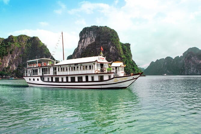 Athena Luxury Cruise in Halong Bay with Meals,Balcony Room & Cave - Evening on the rooftop sundeck