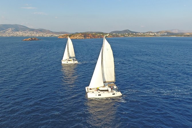 Athens Private Luxury Catamaran Cruise with Traditional Greek Meal and BBQ - Boarding begins with a safety briefing