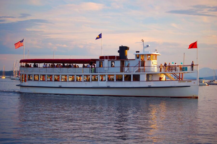 Boston: Harbor Sunset Yacht Cruise - The USS Constitution cannon at sunset