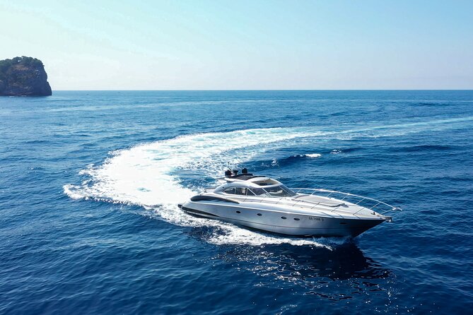 Capri: discover the beauties of the island aboard a Luxury Boat - Seeing Capri’s Faraglioni from the water