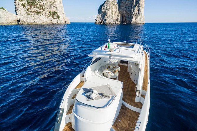 Capri Private Boat Tour from Sorrento, Positano or Naples - Yacht Klase 50 - Cruising toward Capri with drinks on deck