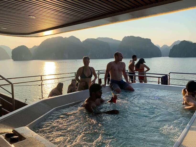 Cat Ba Island: Lan Ha Bay Full-Day with Luxury Cruise - Sunset tea, fruit, and a slower ride home