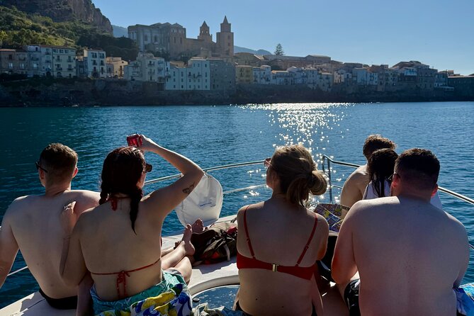 Cefalù : Mini Yacht Tour with Aperitif, Snorkeling and Caves - The long beach at Lungomare Cristoforo Colombo