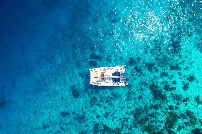 Coral Island & Sunset at Promthep cape by Catamaran Yacht - A short snorkeling stop at Hin Dam Bay