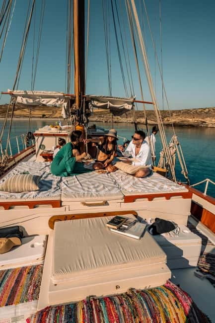Corfu: Sunset Cruise on a Traditional Wooden Sailing Yacht - The old fortress, Garitsa Bay, and Mon Repos from the water