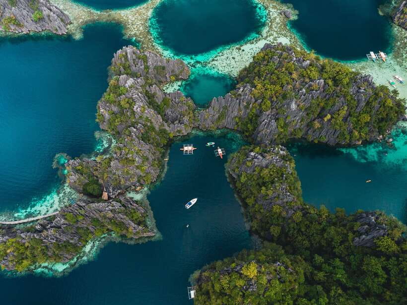 Coron: Private Island-Hopping Tour on a Yacht or Speedboat - Kayangan Lake and the first big view