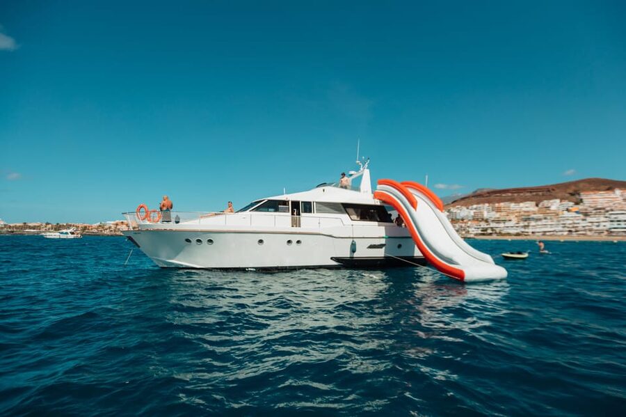 Costa Adeje: Private Yacht Trip with Watersports and Slides - Puerto Colón to the Gulliver Fun Yacht