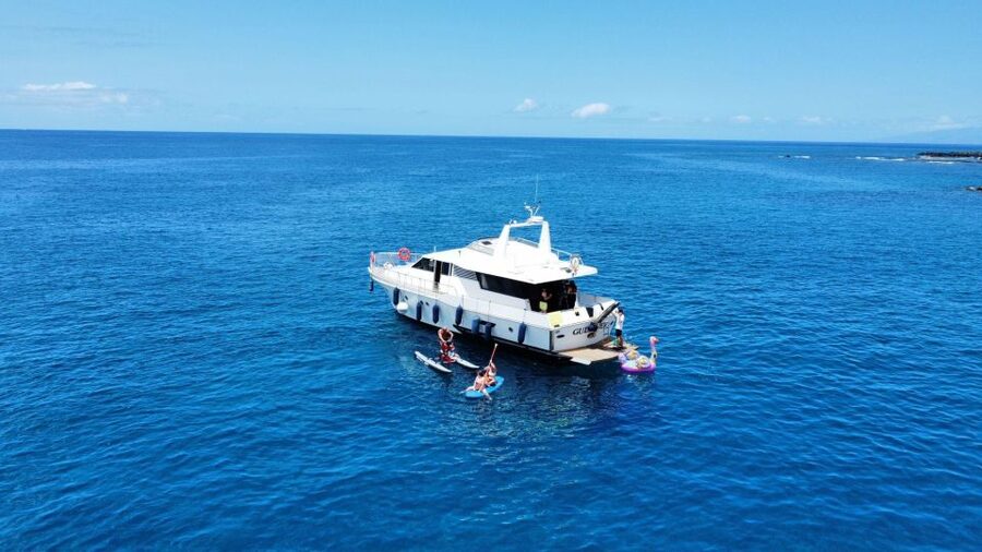 Costa Adeje: Private Yacht Trip with Watersports and Slides - The coastal cruise and the Palm Mar area