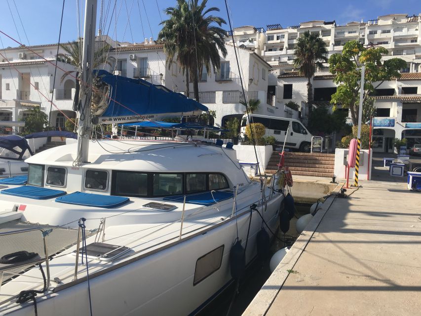 Costa Tropical: Luxury Catamaran Trip with Lunch - Dolphins from the front trampoline