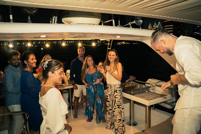 Dubai Night Yacht Party with Canapes and Drinks - Seeing Burj Al Arab after dark