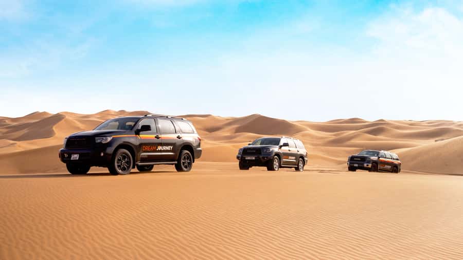Dubai Waves & Dunes: Luxury Yacht Cruise w/ Red Dunes Safari - Lahbab’s red dunes and the first photo stop