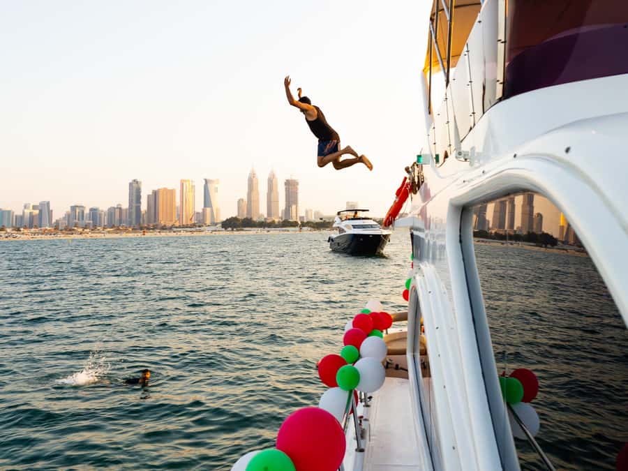 Dubai: Yacht Cruise with Swimming, Snorkeling and BBQ Lunch - BBQ lunch, drinks, and the onboard rhythm