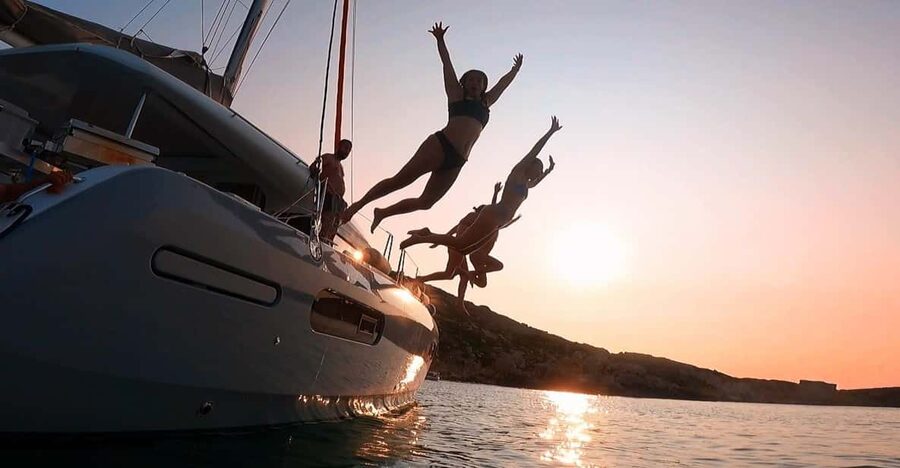 Evening Catamaran Charter - Leaving Marina Di Valletta as evening begins