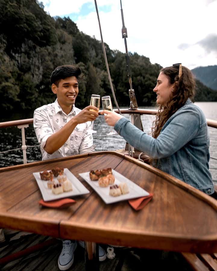 Evening Champagne Cruise on Historic 1935 Motor Yacht. - Champagne, canapés, and a quiet cove