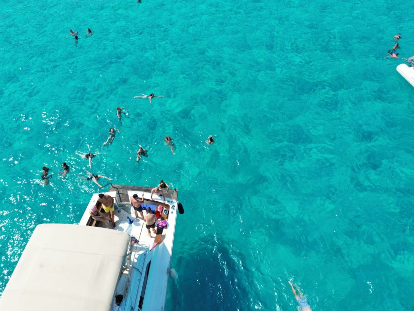 From Trapani: Favignana and Levanzo Yacht Tour with Stops - Favignana’s coves and clear water