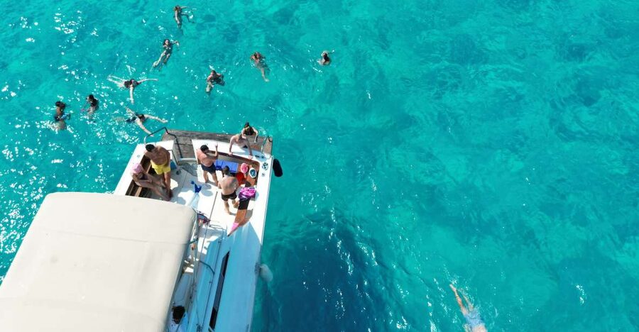 From Trapani: Favignana and Levanzo Yacht Tour with Stops - Lunch with the yacht as your dining room