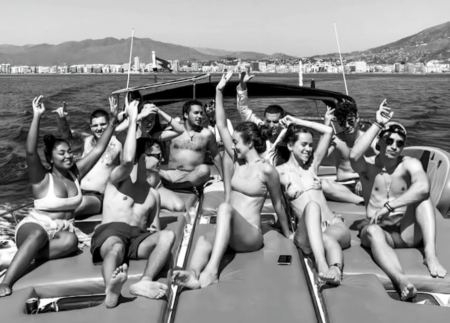 Fuengirola: Dolphin Watching by Yacht with Snacks and Drinks - Searching the open sea for dolphins