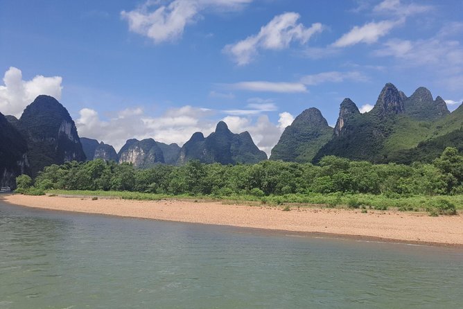 Full-Day Li-River Tour with the 4 Star Luxury Boat VIP Room and Liusanjie Show - Impression Liu Sanjie and the Li River at night