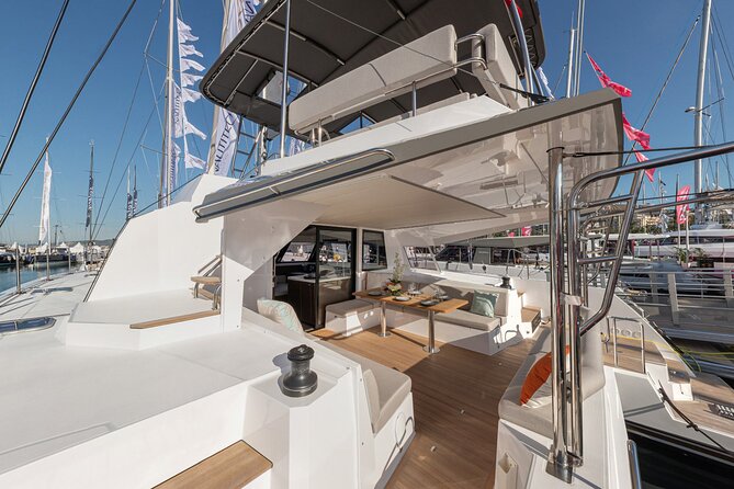 Full-Day Private Tour in Santorini by Luxury Catamaran - Passing Akrotiri Lighthouse and Black Mountain