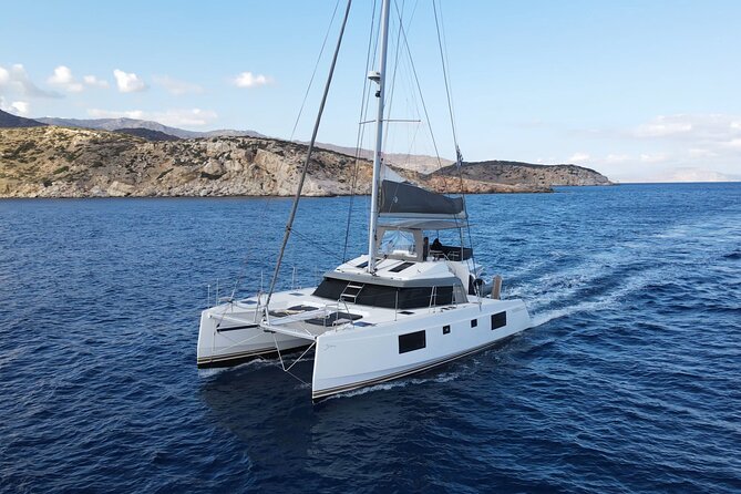 Full-Day Private Tour in Santorini by Luxury Catamaran - Red Beach, where the cliffs do the talking