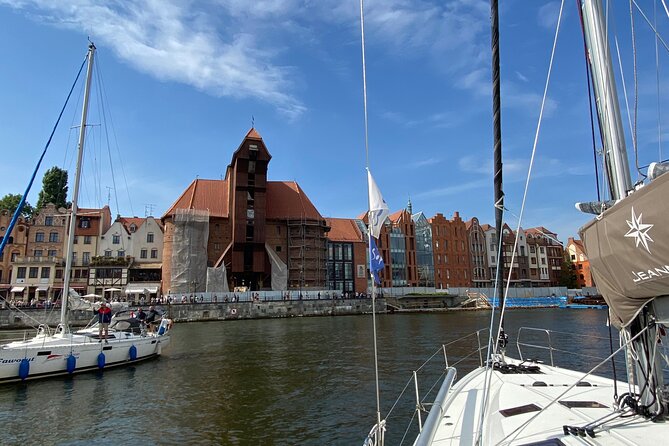 Gdańsk: Motlawa and Port yacht cruise with Welcome Drink - Cranes, dry docks, and ships under repair
