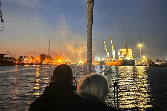 Gdansk: Scenic Evening Yacht Cruise with Welcome Drink - The Crane and Granary Island after dark