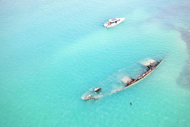 Half Day Luxury Boat Tour in Key West with Snorkeling - Passing a 327-foot museum ship