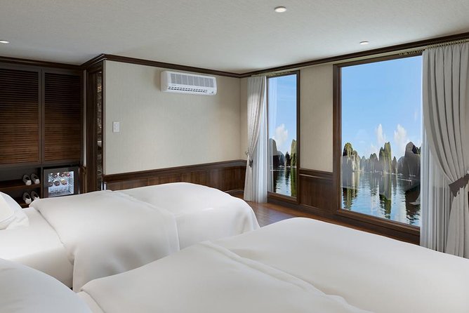 Halong bay luxury cruise 2D/1N: Titop island, Surprise cave, Kayaking, Swimming - Boarding at noon and settling into your cabin