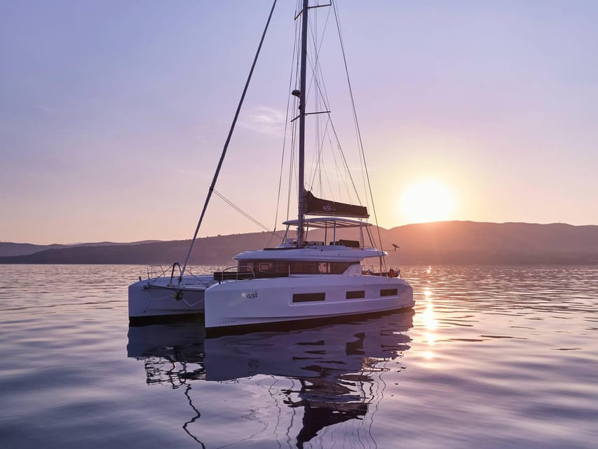 Heraklion: Dia Island Luxury Catamaran Cruise with Meal - Leaving Heraklion from the Old Venetian Harbor