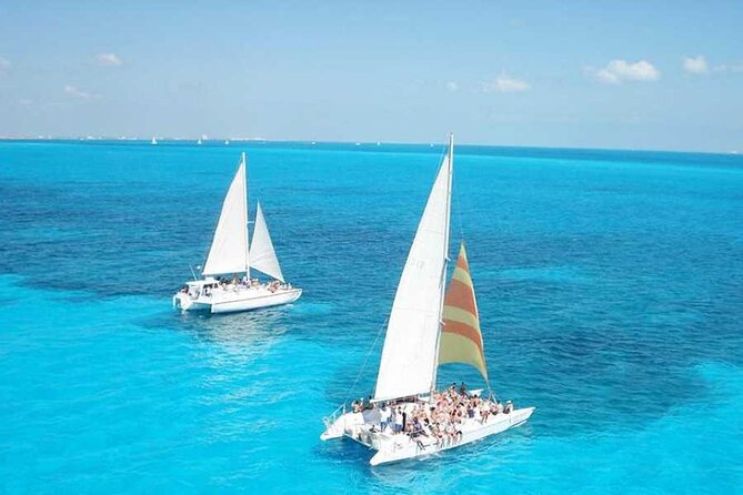 Isla Mujeres Catamaran Luxury Sailing Experience from Puerto Morelos - The day begins with a catamaran ride, not a quiet yacht cruise