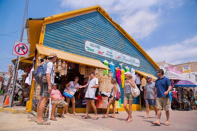 Isla Mujeres Luxury Sailing: Adults Only or Family Friendly - Isla Mujeres: beautiful water, commercial center