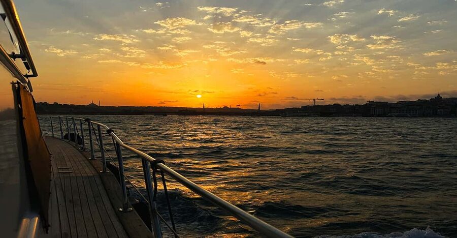 Istanbul: Bosphorus and Golden Horn Sunset Yacht Cruise - Boarding at Kabataş and settling onto the boat