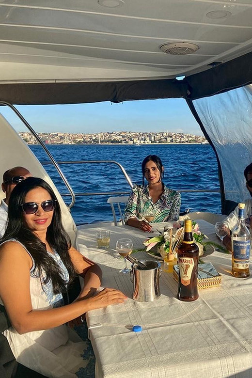 Istanbul: Bosphorus Yacht Cruise at Sunset with Snacks - Sailing past Dolmabahce Palace