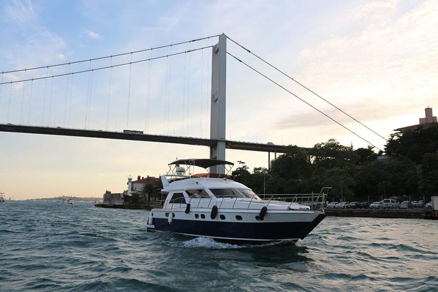 Istanbul: Luxury Yacht Tour at Sunset w Snacks - The yacht: open-air views with an indoor fallback