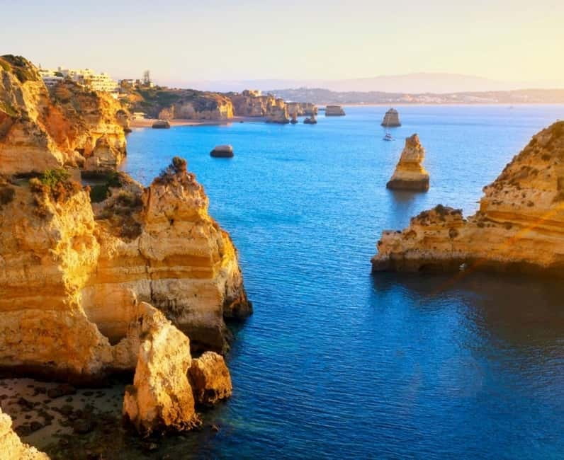 Lagos: Luxury Private Yacht Charter with Drinks and Snacks - Swimming, paddleboards, and snorkeling stops