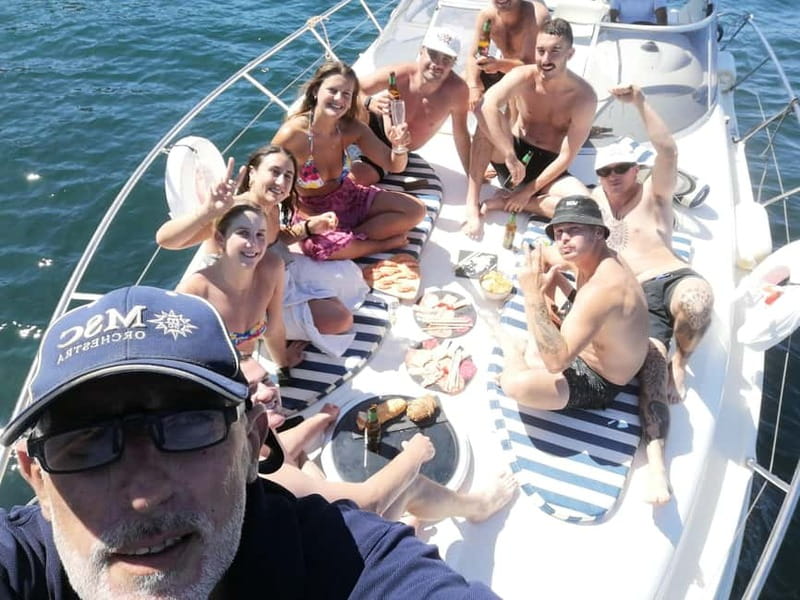 Lagos: Private Luxury Cruise with Tapas and Drinks - Tapas, fruit, and the galley crew