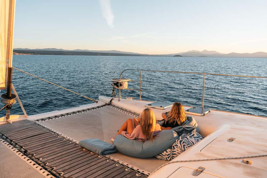 Lake Taupo: Luxury Sailing Catamaran to Māori Rock Carvings - Swimming in clear freshwater