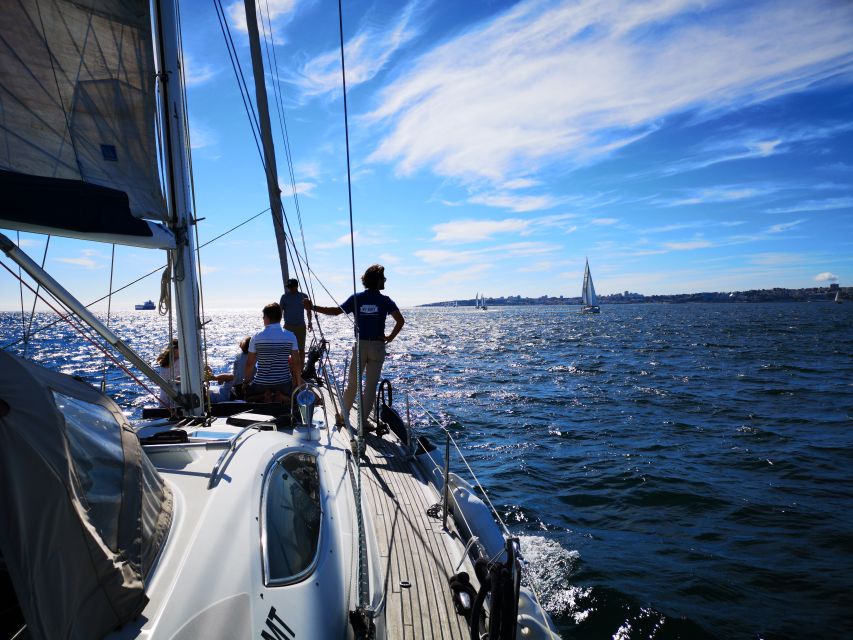 Lisbon: 2-Hour Sailing Yacht Cruise & Guided Tour w/2 drinks - The 25 de Abril Bridge and the view toward downtown