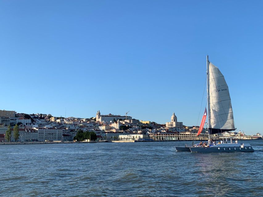 Lisbon: Private Catamaran Charter for up to 18-People - Returning past the Discoveries Monument and MAAT