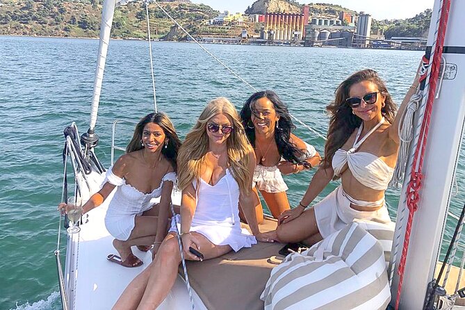 Lisbon Private Luxury Boat Tour with Welcome Drink - Passing beneath the 25 April Bridge