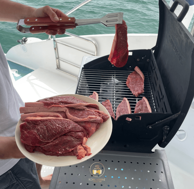 Lisbon: Private Luxury Catamaran Tour with Welcome Drink - Wine, drinks, music, and catering