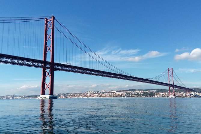 Lisbon Sailing Tour on a Luxury Sailing Yacht with 2 Drinks - A drink, Portuguese cheese, and time to look around