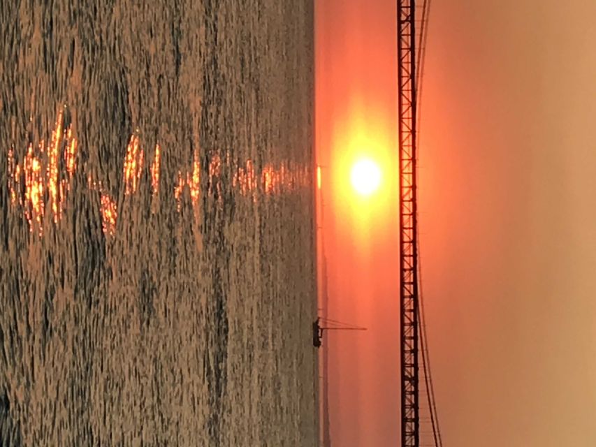 Lisbon: Sunset and Wine Luxury Catamaran Cruise - Settling onto the luxury catamaran