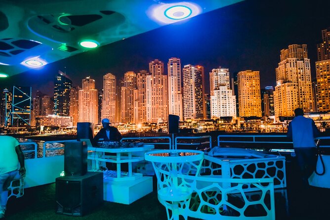 Lotus Mega Yacht Luxury Cruise with Live DJ, Dinner & Transfers - Burj Al Arab and the JBR skyline after dark